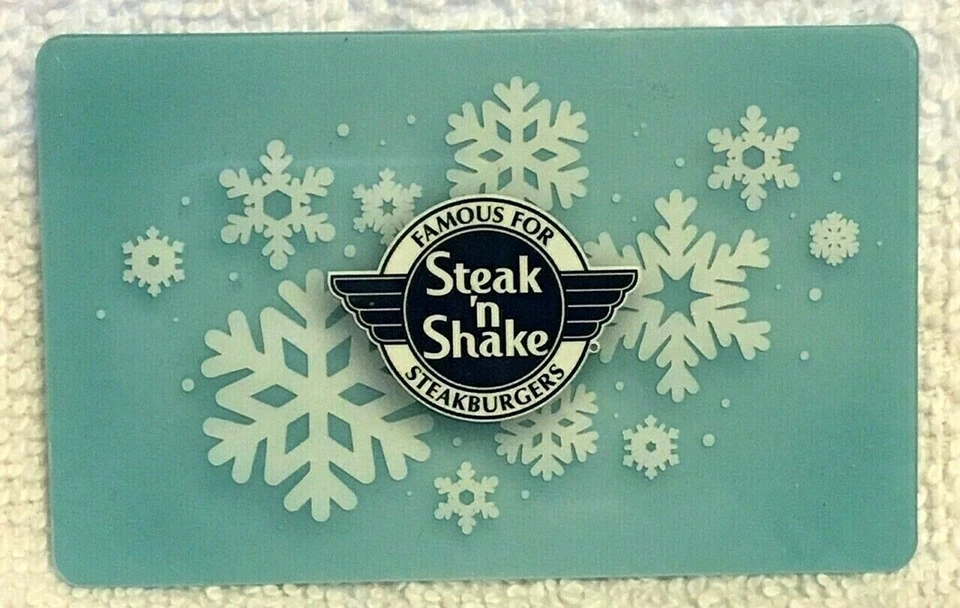 Tarjeta de regalo Steak N Shake White Snowflakes fondo azul claro dimensional 2018 Foto 1 de 1