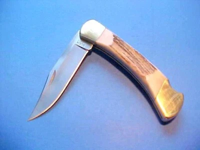 RARE UNUSED CUSTOM BUCK 110 KNIFE ELK STAG HANDLE CLAM SHELL SHEATH CARD READ - Image 1 of 4