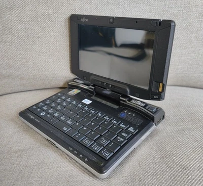 Portátil Fujitsu LifeBook U1010 vintage, sistema Windows 7 máquina mini libro Foto 1 de 4