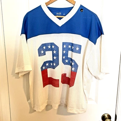 NUEVO CON ETIQUETAS Hollister Hombres Boxy Malla Jersey Talla Grande Americana Rojo Blanco Azul 2025 EE. UU. Foto 1 de 4