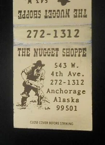 70er Jahre? The Nugget Shoppe 543 W. 4th Ave. Anchorage AK Streichholzschachtel Alaska - Bild 1 von 1
