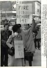 1973 Press Photo Striking Providence teachers hold up picket signs. - lry01501