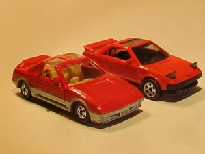Lotto 2x 1984 Toyota MR-2 Matchbox & Tomica #24 1/64 gamma pressofusa leggi sfuse - Foto 1 di 7