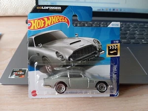 2024 HOT WHEELS - ASTON MARTIN 1963 DBS 007 SCHEDA CORTA 1/64 CIRCA *NUOVA* - Foto 1 di 4