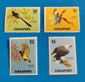 SINGAPORE 1962 BIRDS 4v - KINGFISHER HUMMINGBIRD EAGLE SHAMA - bird stamps MNH - Picture 1 of 2