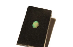 Edelopal Etiopia cabochon 9,5x8 mm 1,55 ct. U28150 - Foto 1 di 3