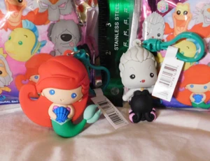 2 kleine Meerjungfrau Taschenclips: Arielle & Ursula Schurke Disney Serie - Bild 1 von 12