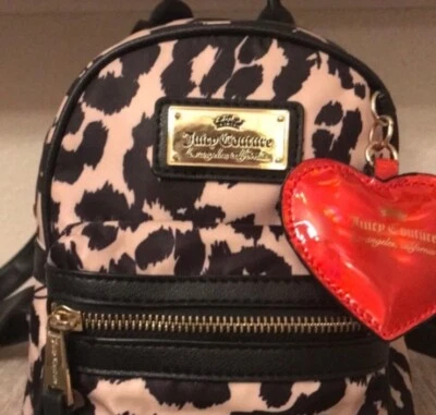 Mini Mochila Juicy Couture Glam Rock Leopardo con Dije Corazón Rojo Foto 1 de 4