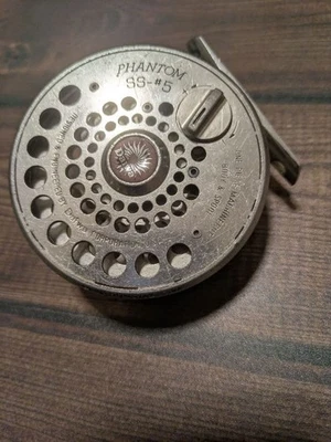 Mulinello a mosca Daiwa PHANTOM SS-#5 argento - Immagine 1 di 4