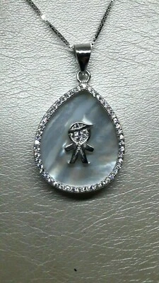 Ciondolo con Collana in Argento 925/1000 Rodiato Bimbo con Zirconi e Madreperla - Immagine 1 di 4