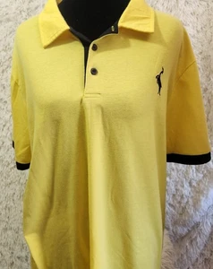Polo Mujer Lg Amarillo Con Cuello Negro Borde y Antílope Bordado? Logo - Imagen 1 de 10