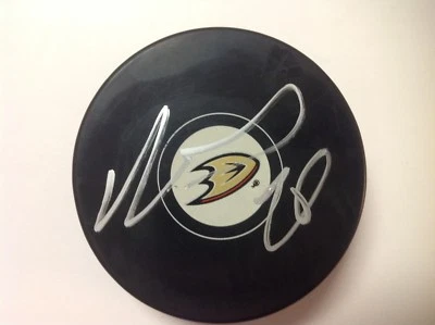 Brandon Montour Signed Autographed Anaheim Ducks Hockey Puck a - Image 1 of 2