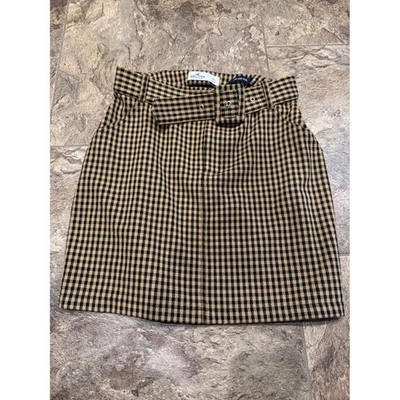Minifalda Hollister Gingham XS tiro ultra alto con cinturón línea A bronceada negra usada en excelente estado Foto 1 de 3