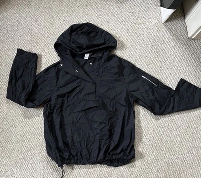 Rompevientos de bolsillo con capucha negra H&M talla S Foto 1 de 4
