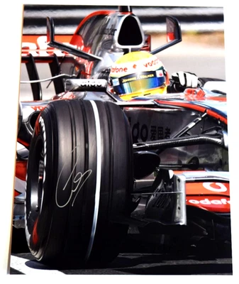 Lewis Hamilton AUTOGRAPHED Hand Signed 5 x 6 3/4" Photo Driving a McLaren F1 Car - Image 1 of 2