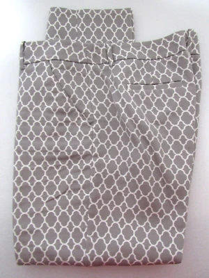 Calça Merona tamanho 12 marrom stretch estampa geométrica perna magra frente plana - Imagem 1 de 4