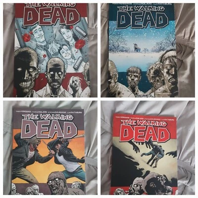 The Walking Dead Volume 1,2,27 and  28 - Robert Kirkman Walkers/Zombies - Image 1 of 4