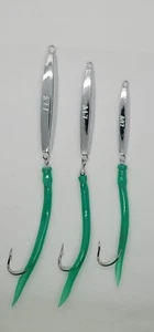 3 neue Ava Diamond Jigs 1,2,3oz Split Tube Tails Bluefish Striper Jigging Casting - Bild 1 von 4