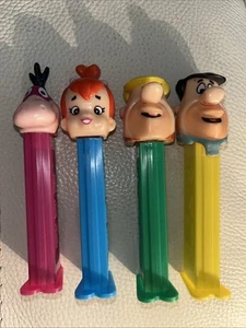 Pez Dispenser Lot of 4 FLINTSTONES Fred Barney Dino Pebbles Vintage - Picture 1 of 3