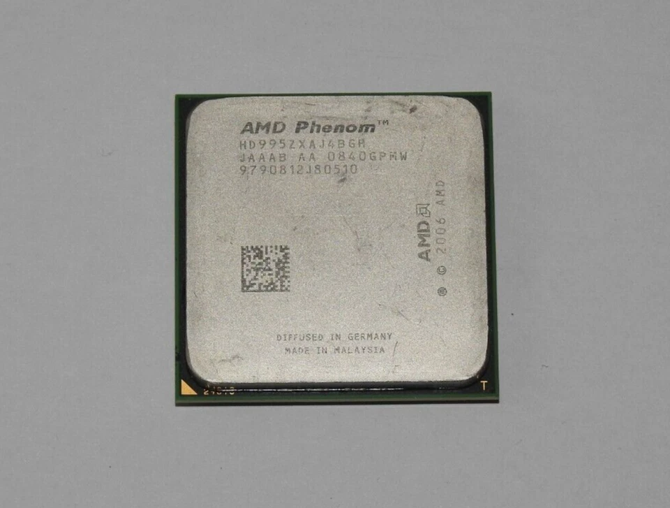 AMD Phenom X4 9950 HD995ZXAJ4BGH Prozessor CPU Sockel AM2 + Wärmeleitpaste - Bild 1 von 1