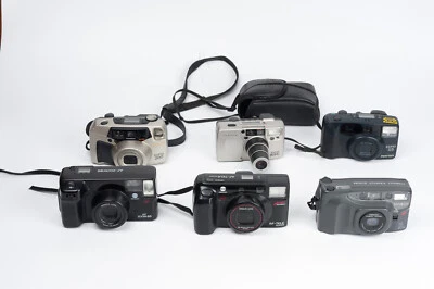 Lote de cámaras compactas Pentax y Milota  para piezas ( no funcionan) - Imagen 1 de 4