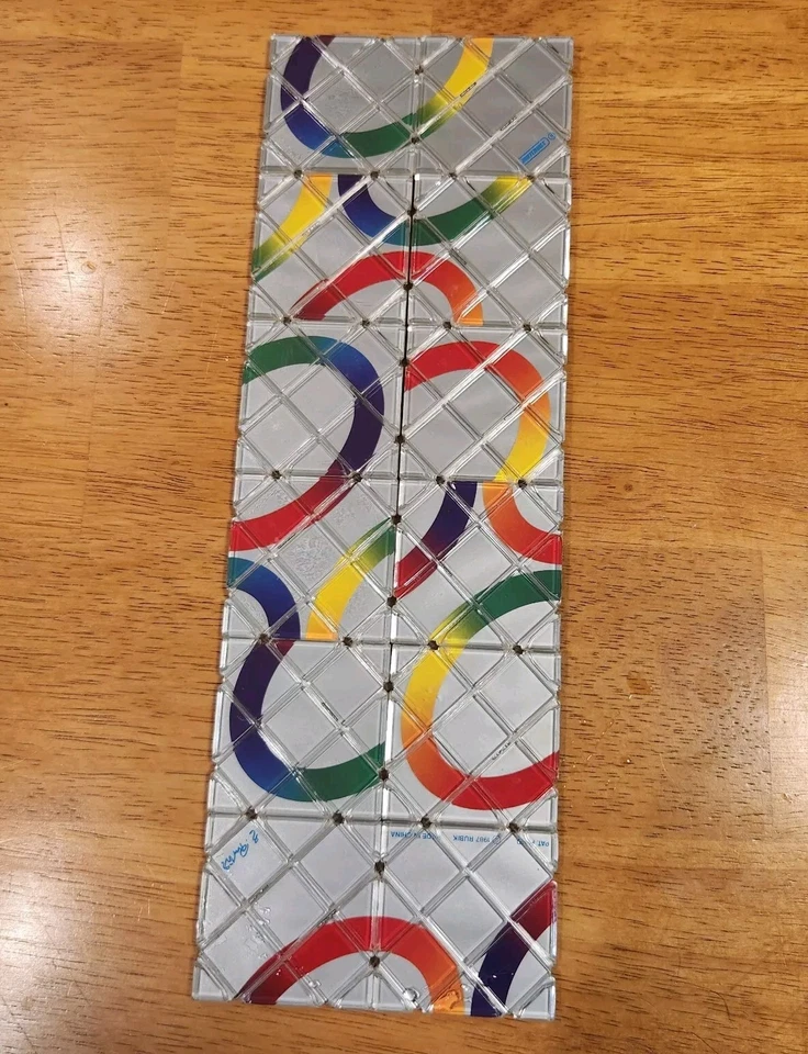 1987 Rubik’s Magic Puzzle Link the Rings Matchbox Silver Brainteaser Rubiks - Image 1 of 4