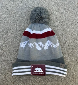 Gorro CIRQUE California Republic Pom para hombre con puños gris tejido montaña - Imagen 1 de 6