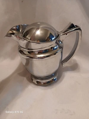 Salsa de plástico de aspecto plateado Foto 1 de 3