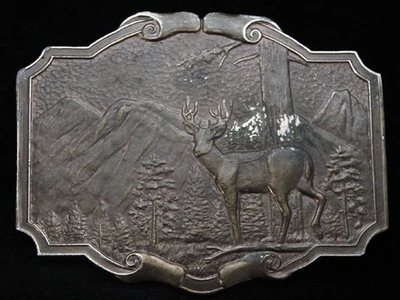 OG13103 VINTAGE 1974 **DEER IN MOUNTAIN FOREST** JAMES LIND ARTWORK BELT BUCKLE - Image 1 of 2