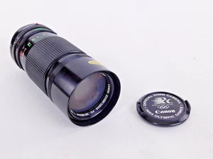Canon Zoom Lens FD 70-150mm f4.5-5.6 *PARTS OR REPAIR, includes lens 2-caps - Picture 1 of 9