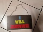 Holzschild, Deko-Schild grau mit bunten Aufdruck  " I will survive! "