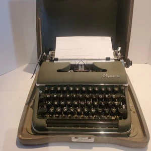 Máquina de escribir manual portátil Olympia DeLuxe SM3 1957 vintage y estuche serie #931260 - Imagen 1 de 10