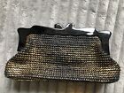 French Connection gold/black ruffia clutch bag