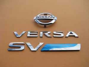 12 13 14 15 16 17 18 19 NISSAN VERSA SV SEDAN REAR EMBLEM LOGO BADGE SIGN A46854 - Picture 1 of 6