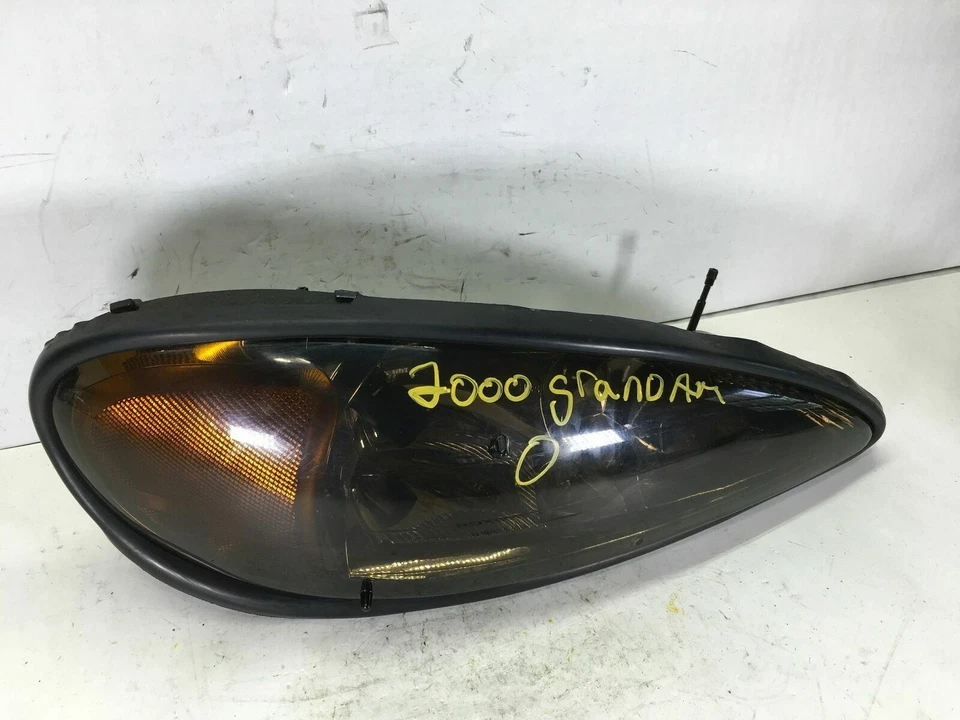 PONTIAC GRAND 2000 AM FARO DELANTERO DERECHO LÁMPARA HALÓGENO NEGRO LENTE FÁBRICA Foto 1 de 4