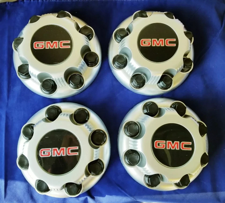 Tapa central de rueda 4 piezas 03-15 GMC Savana Sierra Yukon XL 8 tacos PLATA MATE  Foto 1 de 1