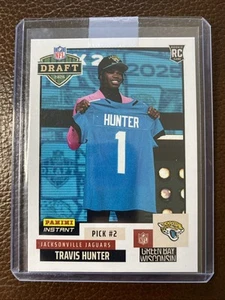 EN VIVO (1) 2025 Panini Instantáneo NFL Draft Night #2 Travis Hunter RC Novato JAGUARS - Imagen 1 de 2