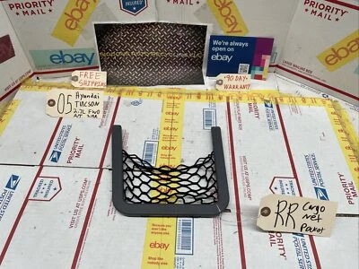 05-09 HYUNDAI TUCSON MALETERO TRASERO DERECHO CARGA RED BOLSILLO Foto 1 de 4