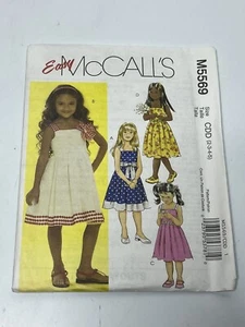 Kleid & Schärpe Mädchen Größe 2-5 ungeschnitten Nähmuster M5569 Sommerkleid Partykleid - Bild 1 von 2
