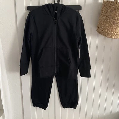 Antiguo conjunto de chaqueta y pantalones jogger con capucha y cremallera negros azul marino para niñas talla pequeña (6-7 años) Foto 1 de 4