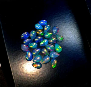 Natural Ethiopian Opal Pear Cabochon Loose Gemstone Lot 25 Pcs 4X6 MM 6.40 CT - Picture 1 of 4