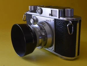 Minolta 35 Series II with lens hood, filters, 2 extra bodies, case - Picture 1 of 13
