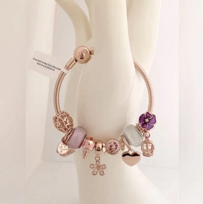 Linx Rose Gold Charm Bracelet with Pink and Purple Themed Charms - Image 1 of 4