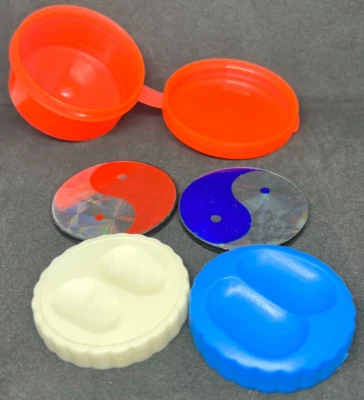 Lot of 4 Pog 1990's Slammers (2) Metal and (2) Plastic with grooves & container - Image 1 of 2