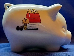 A Charming Charlie Brown Doghouse 3 3/4" Long Porcelain Piggy Bank - Picture 1 of 4