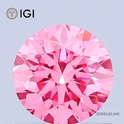 IGI Certified 0.81 Carat Fancy Vivid Pink VVS2 Round Cut CVD Lab Grown Diamond - Image 1 of 4