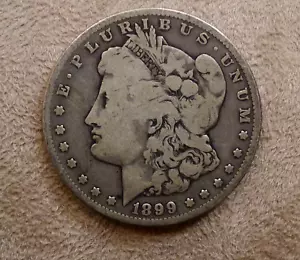 1899-O MORGAN SILVER DOLLAR (13) - Picture 1 of 6