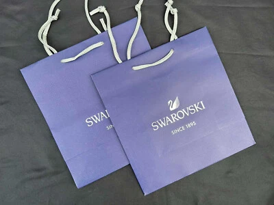 "Nuevo juego de 2 bolsas de regalo de papel de compras azul Swarovski con logotipo talla 9""x 9,5""x 4,5""" Foto 1 de 3