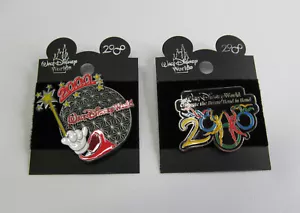 Walt Disney World - Two 2000 Millennium Pins on Orignal Card Backings - Picture 1 of 2