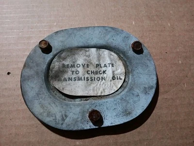 Placa de cubierta de verificación de fluido de transmisión. Pontiac Tempest Lemans 1962.  OEM Foto 1 de 3